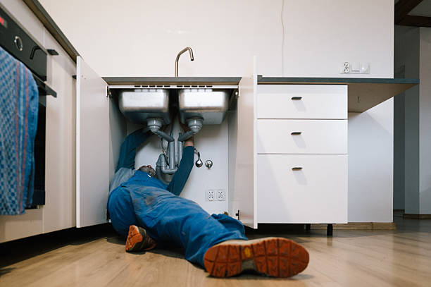 Professional Drain Cleaning technician working in Saint James City, FL